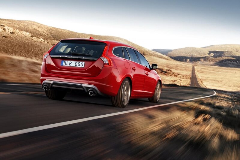 Red Volvo V60 on a winding road
