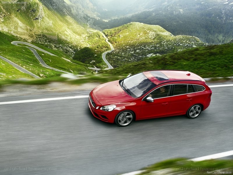 Red Volvo V60 on mountain road