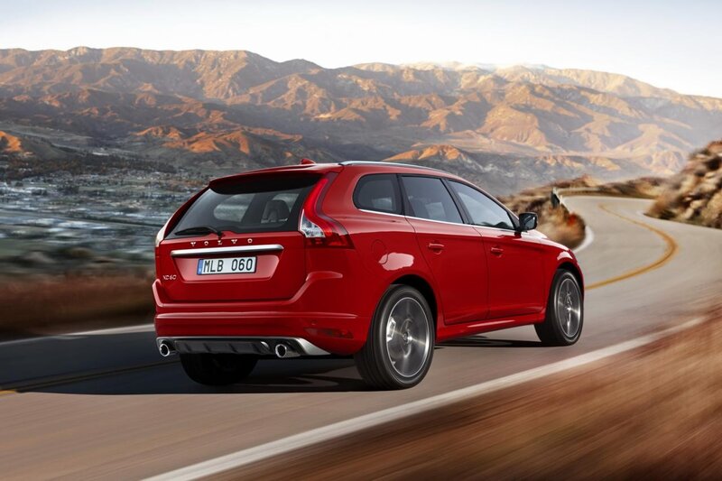 Red Volvo XC60 on mountain road