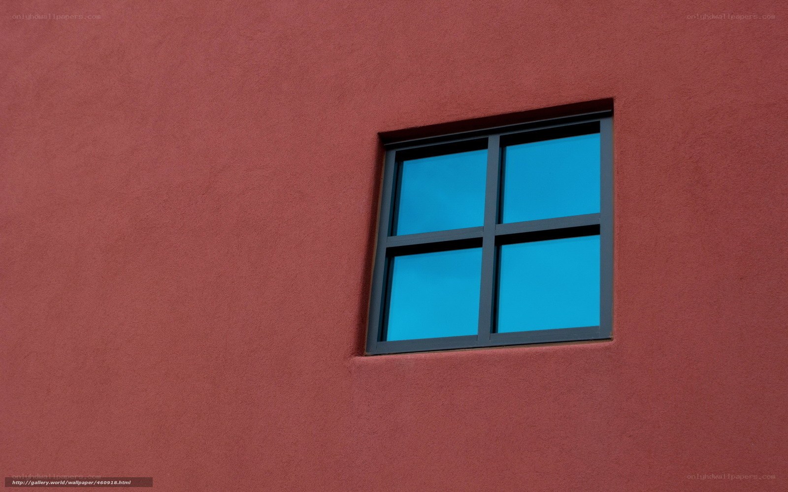 Red wall with blue window