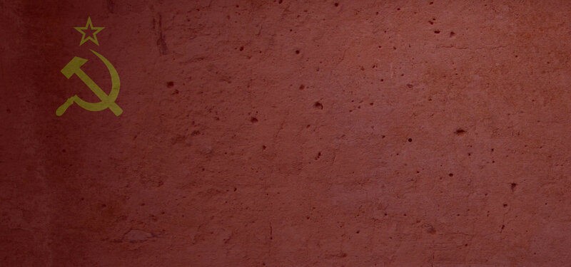 Red wall with hammer and sickle