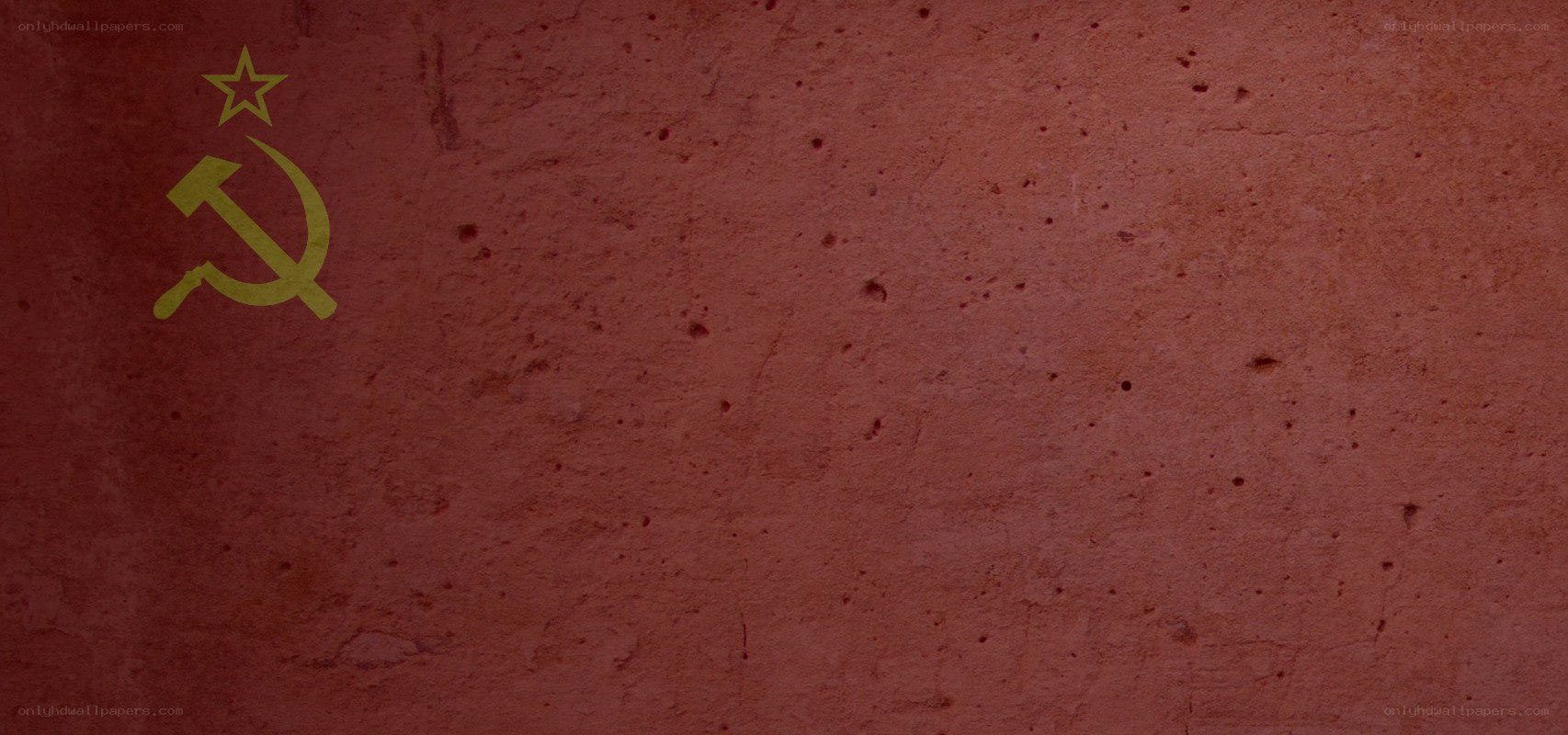 Red wall with hammer and sickle