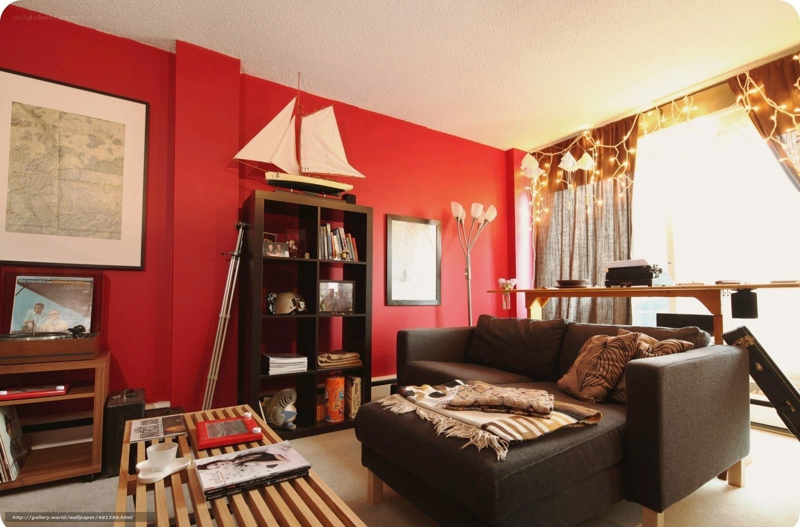 Red-walled living room with model ship