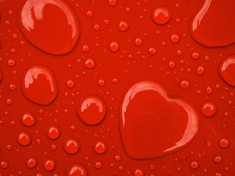 red water droplets on surface