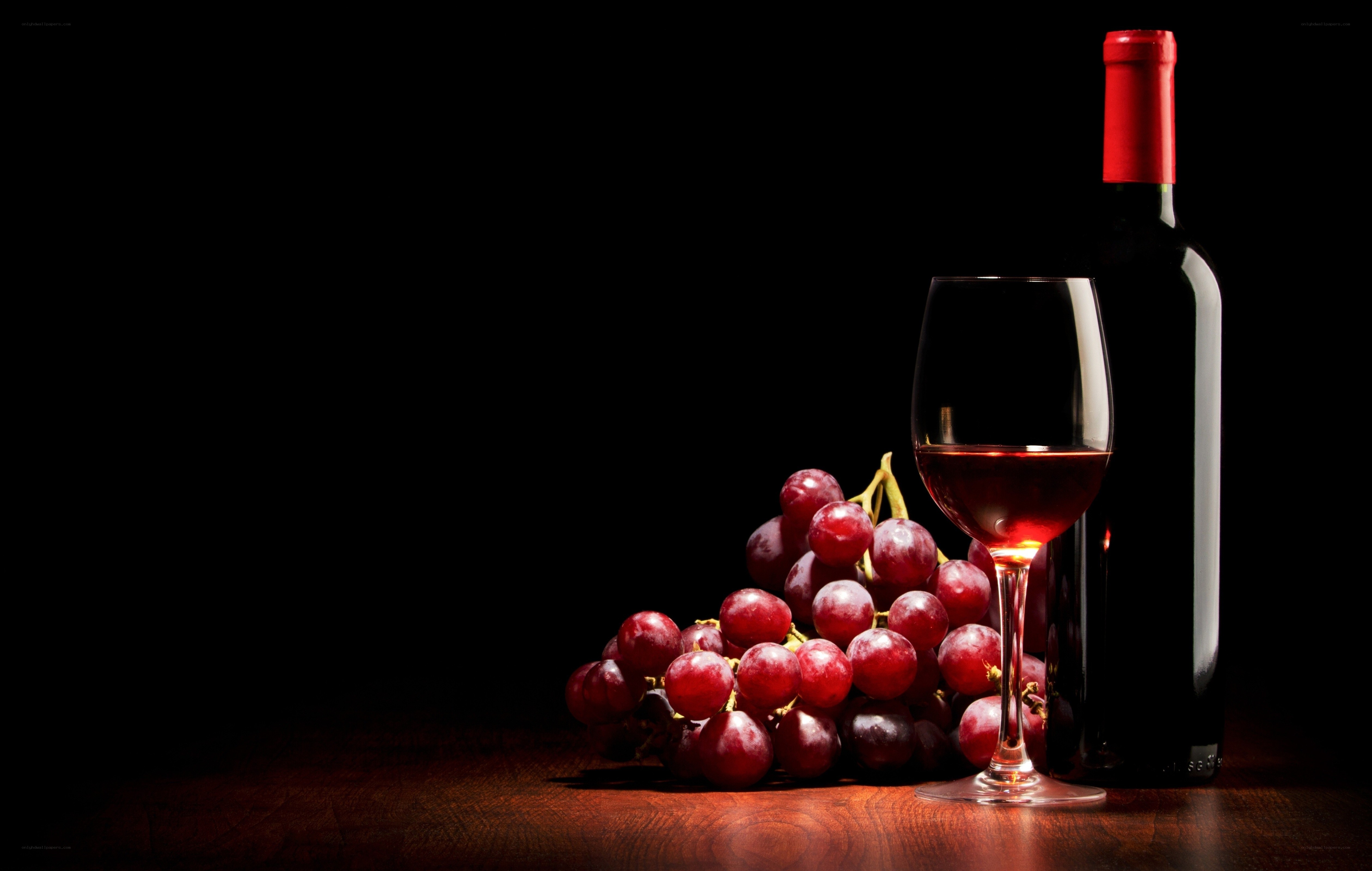 Red wine and grapes