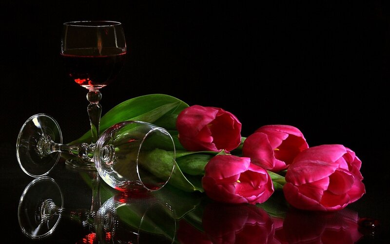 Red wine and tulips still life