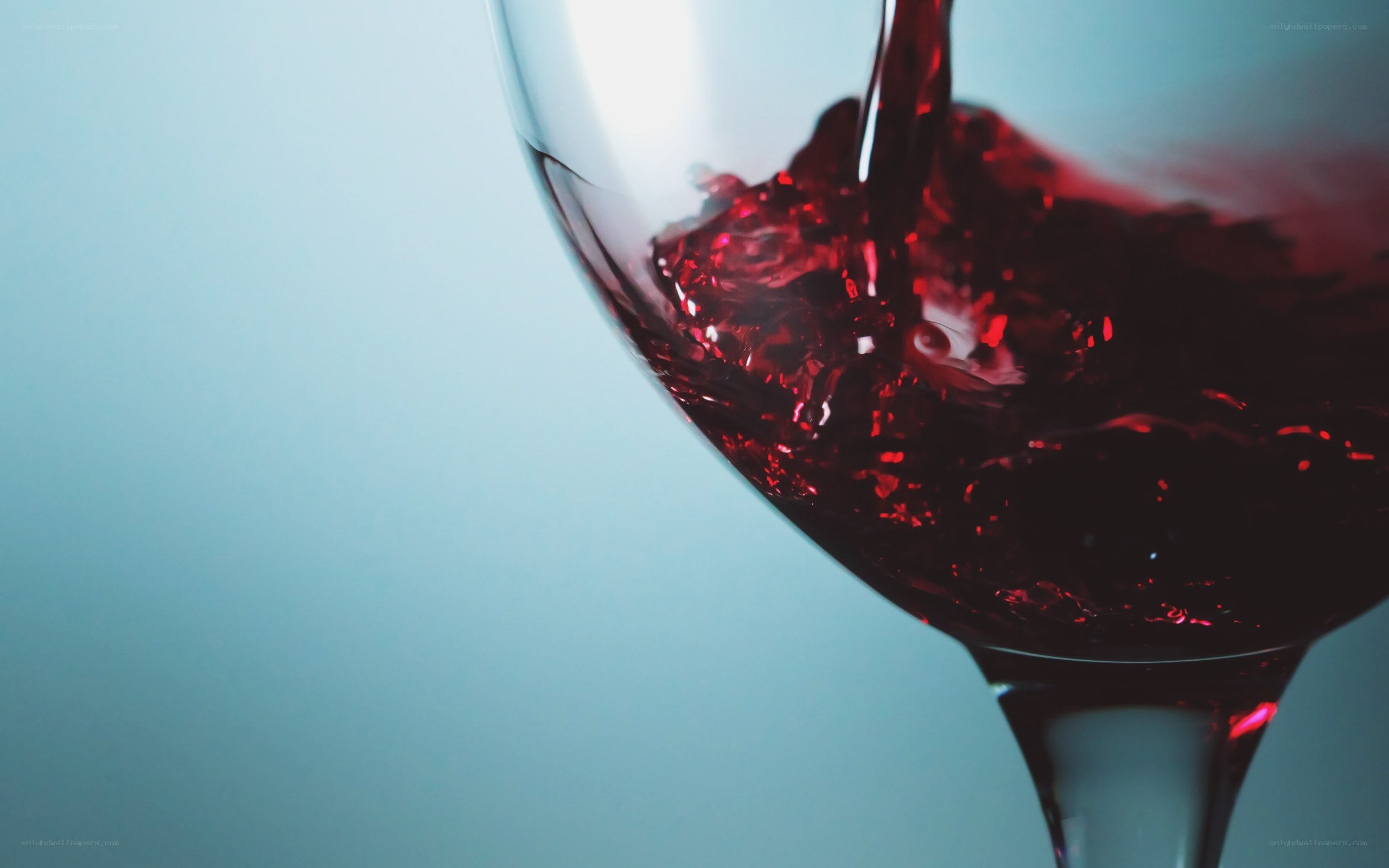 Red wine being poured