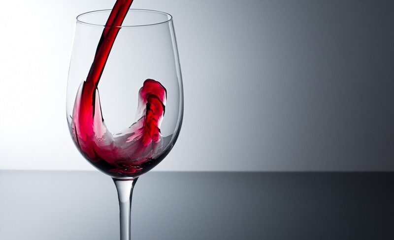 Red Wine Being Poured — Dramatic, Photograph