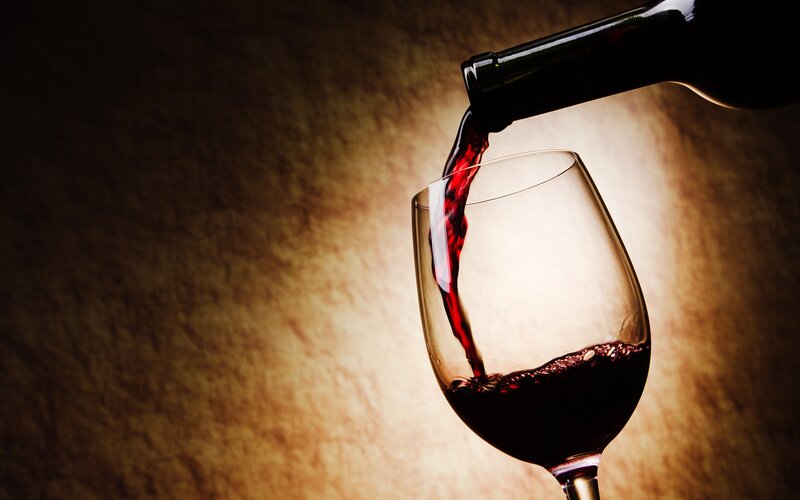 Red Wine Being Poured — Dramatic, Photograph, Wine Glass, Bottle
