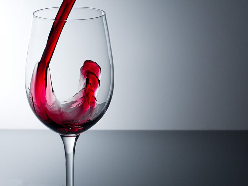 Red Wine Being Poured — Dramatic