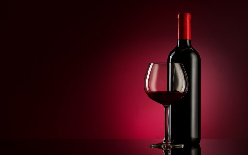 Red Wine Bottle and Glass — Dramatic, Photograph