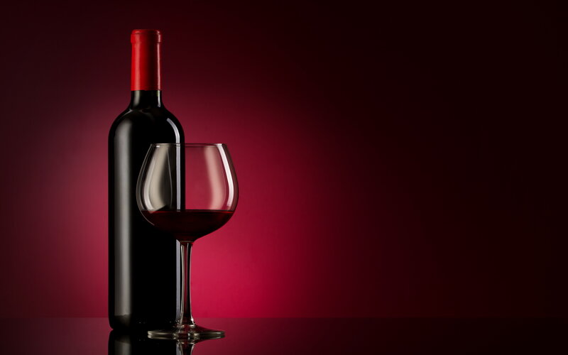 Red Wine Bottle and Glass — Dramatic