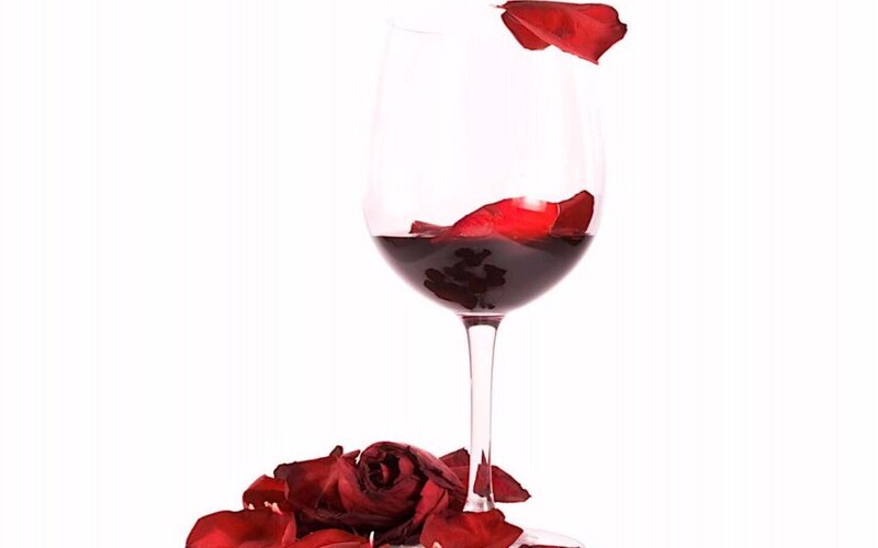 Red Wine Glass with Rose Petals