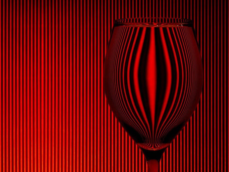 Red wine glass with striped pattern