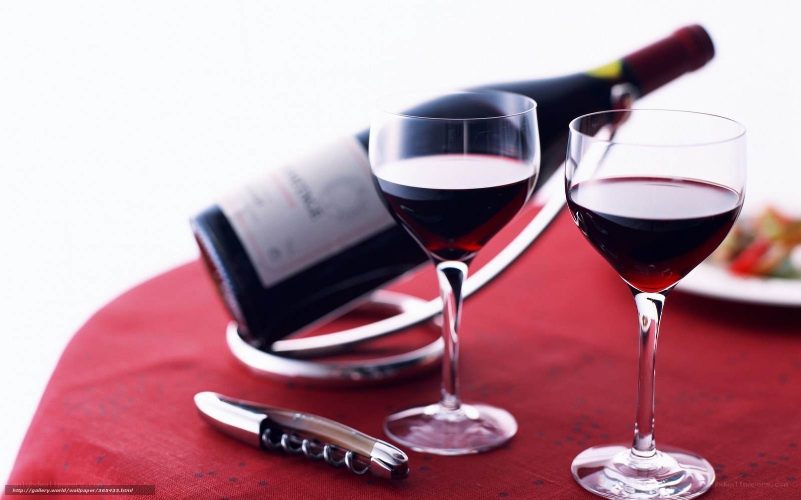 Red wine glasses and bottle