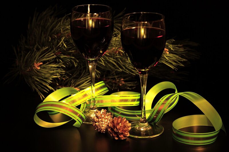 Red wine glasses with pine and ribbon