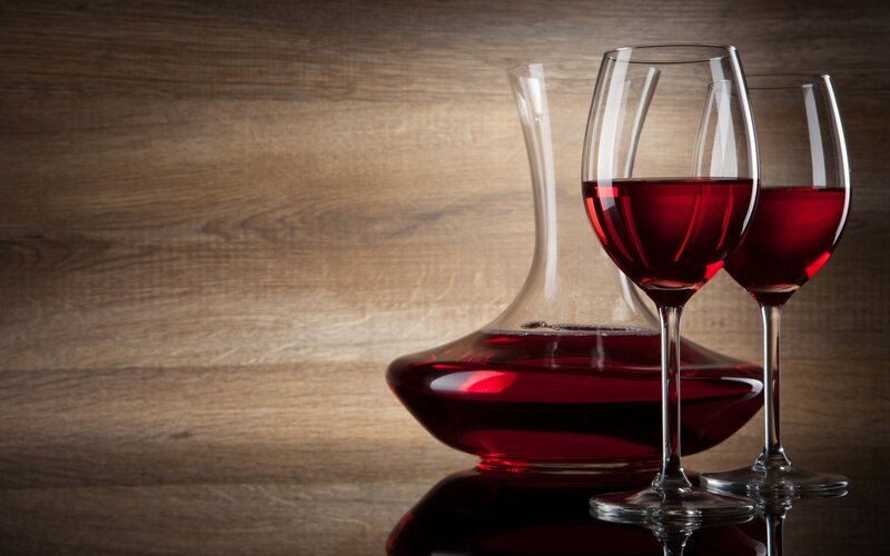 Red wine in glasses and decanter