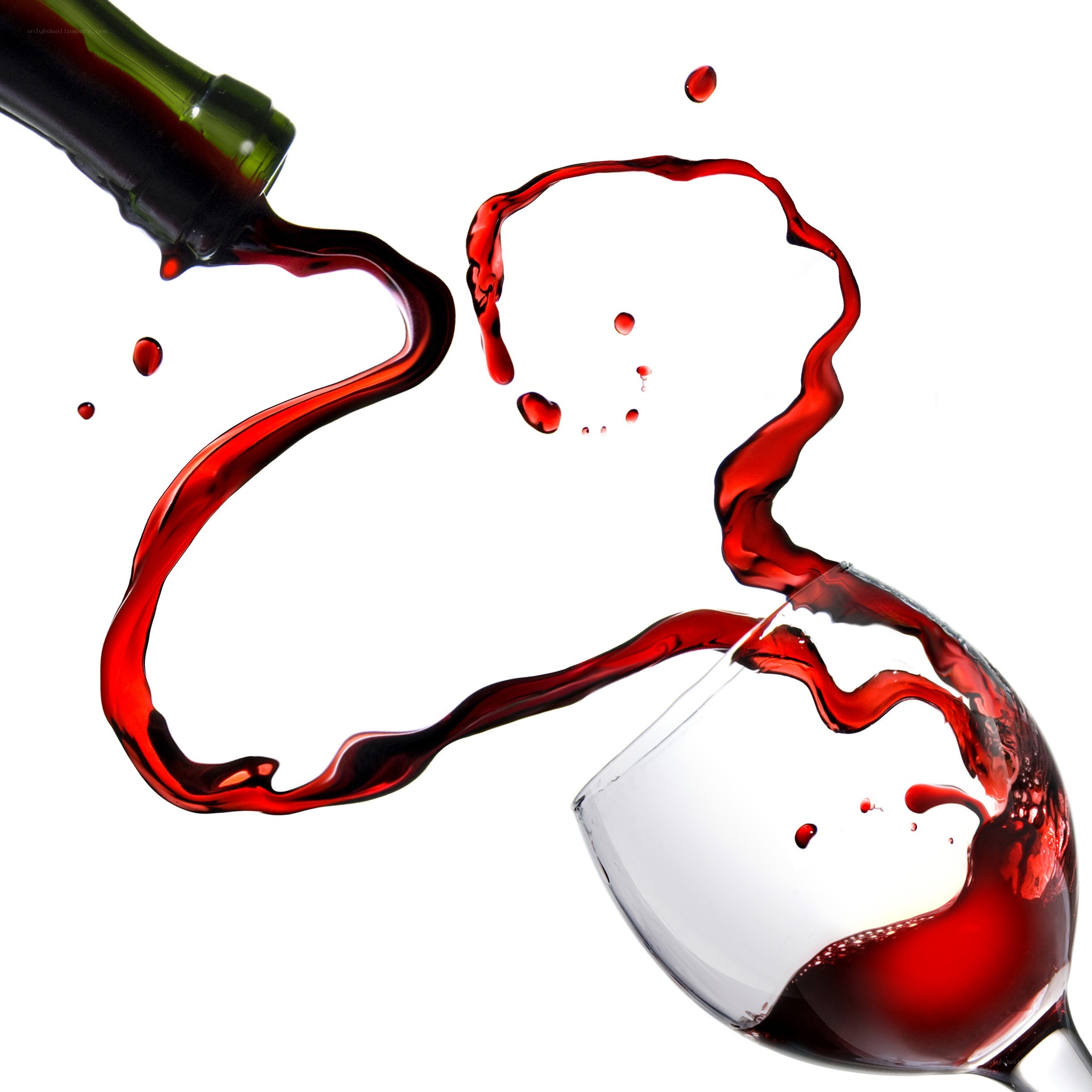 Red wine pouring into glass