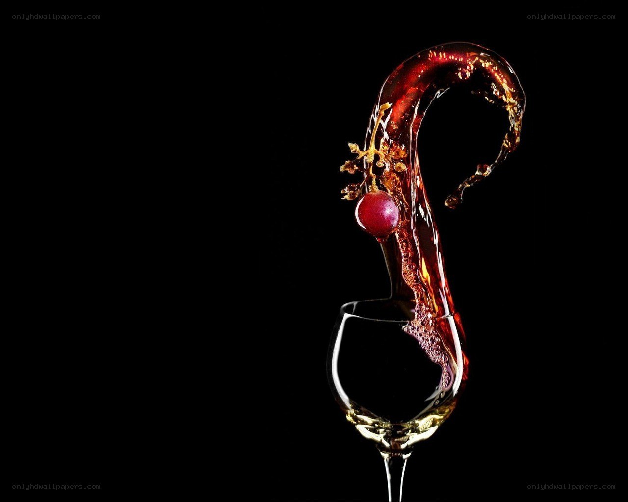 Red wine splashing into glass