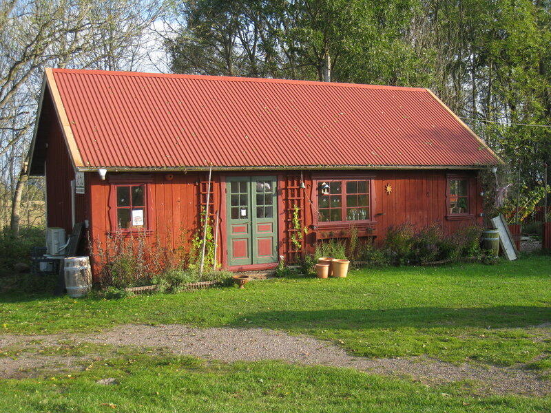 Red Wooden Cabin — Serene, Afternoon