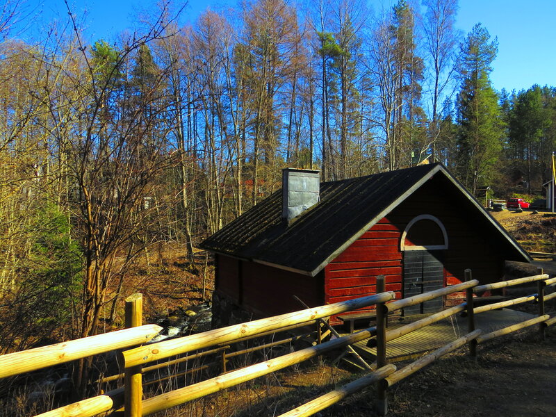 Red Wooden Cabin — Serene, Spring
