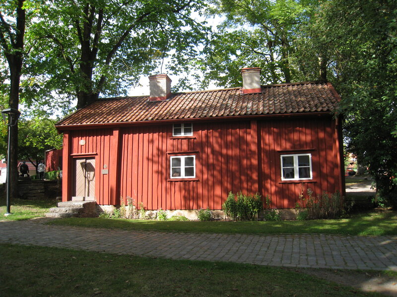 Red Wooden House — Serene, Afternoon, Photograph