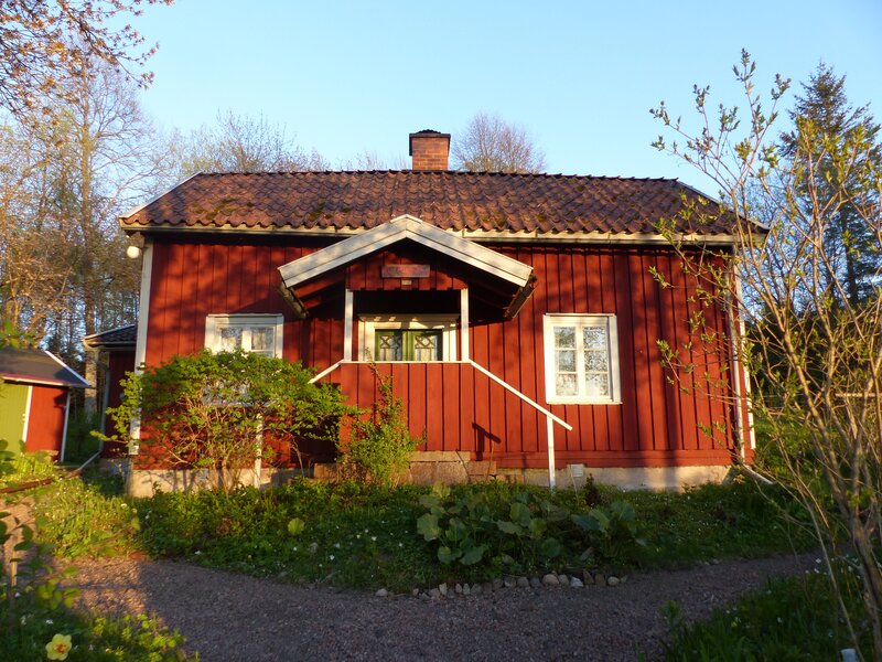 Red Wooden House — Serene, Spring