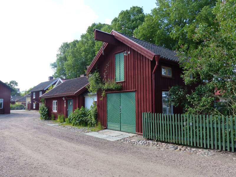 Red Wooden Houses — Serene