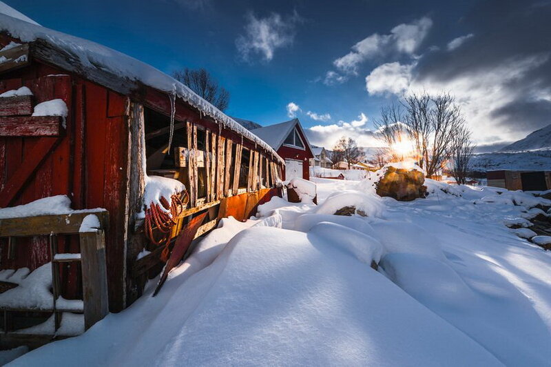 Red Wooden Shed in Snow