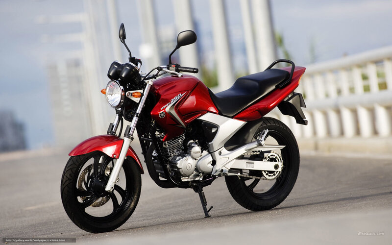 Red Yamaha motorcycle on bridge