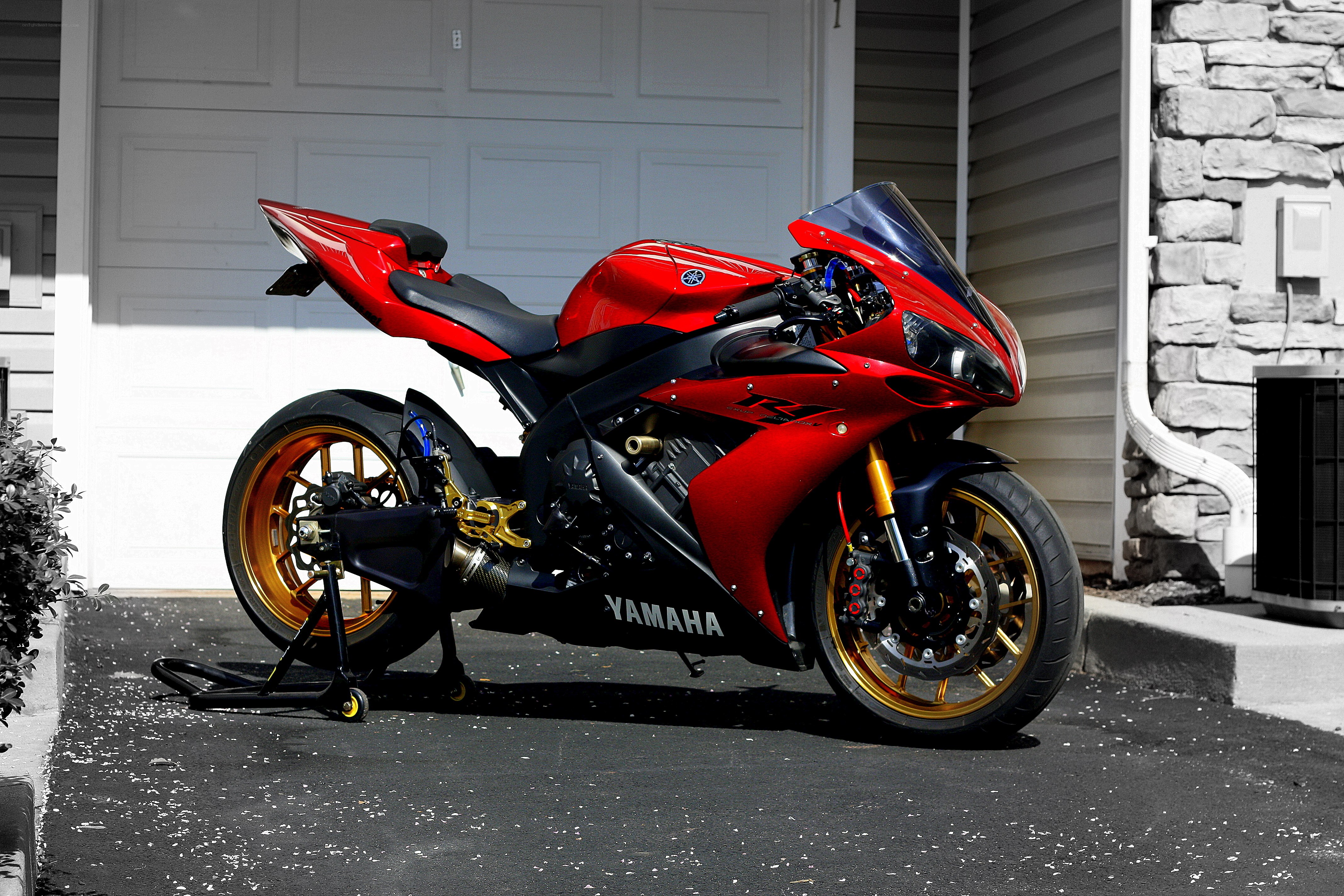 Red Yamaha sportbike on stand