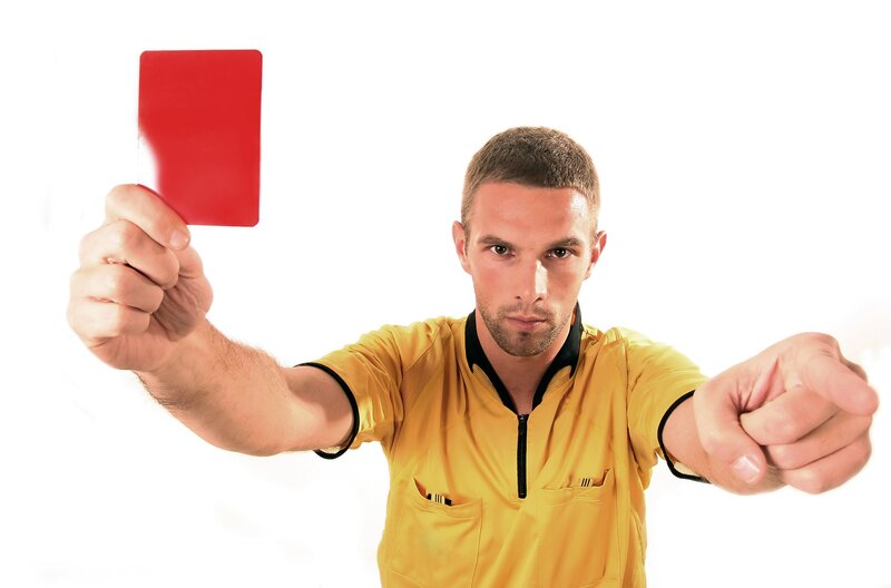 Referee Holding Red Card
