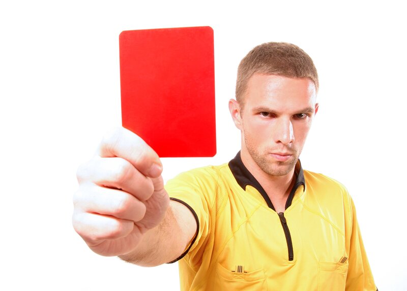 Referee Holding Red Card — Yellow