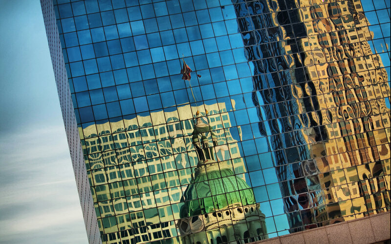 Reflection of a dome in glass