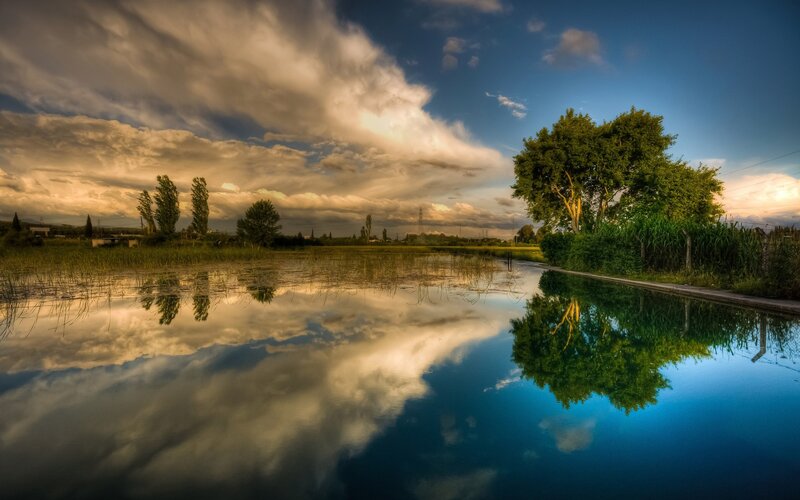 Reflection of Clouds in Water — Blue