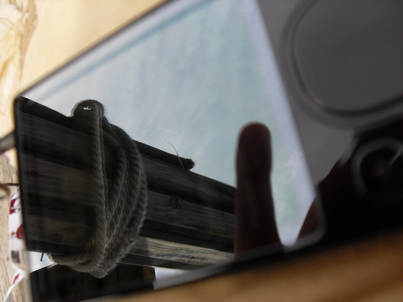 reflection of rope on wood