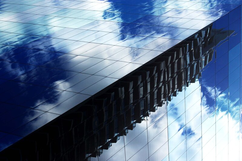 Reflection of sky on glass building