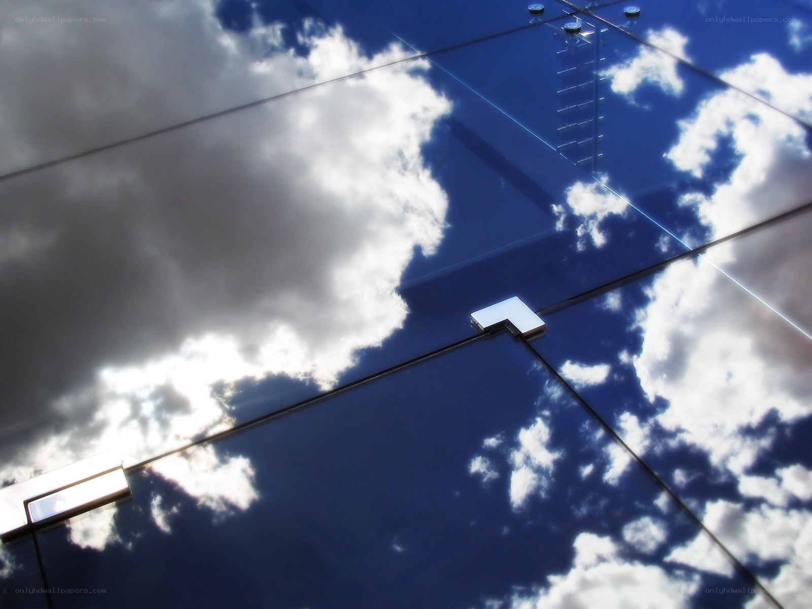 Reflective glass panels with sky