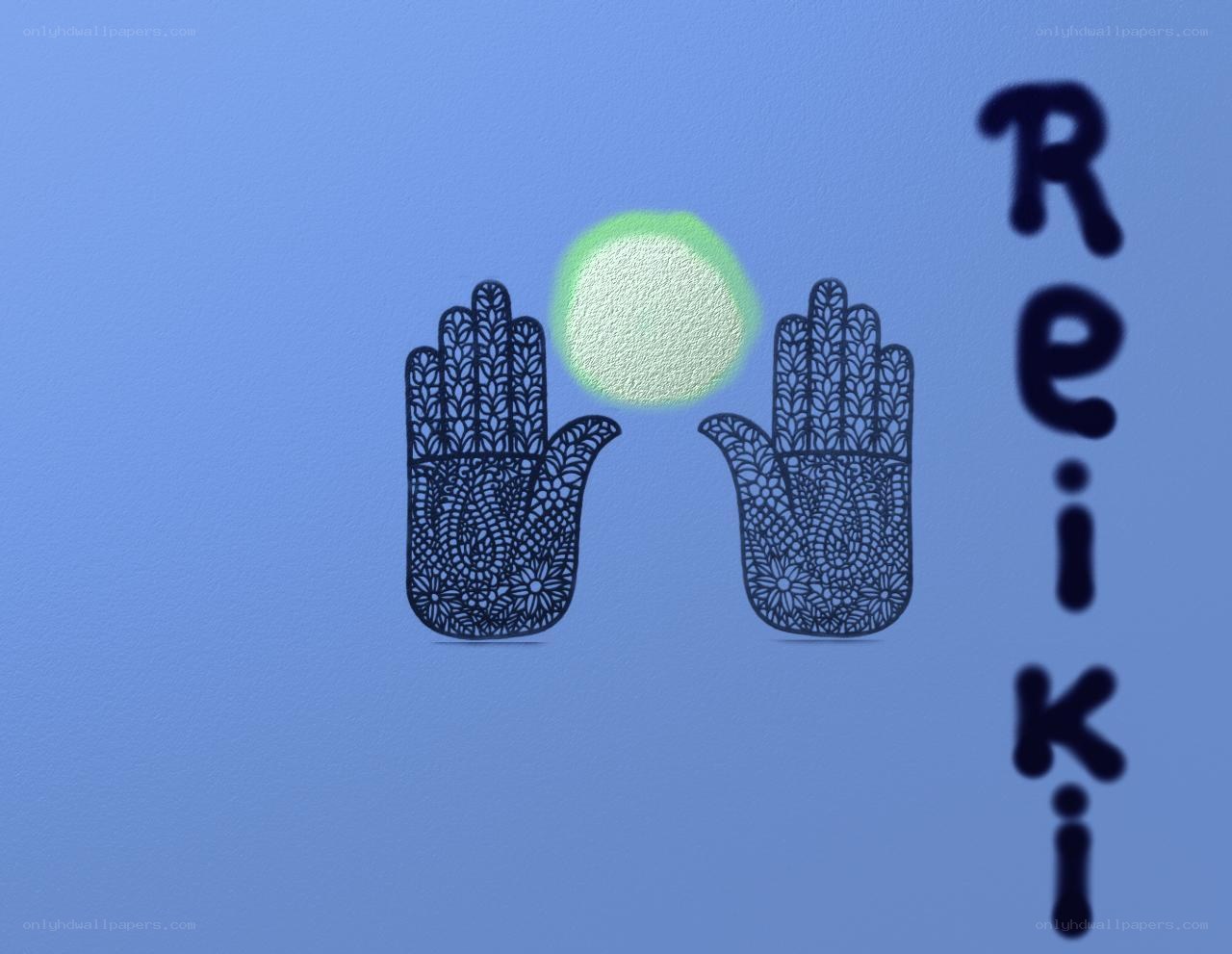 Reiki hands with glowing orb