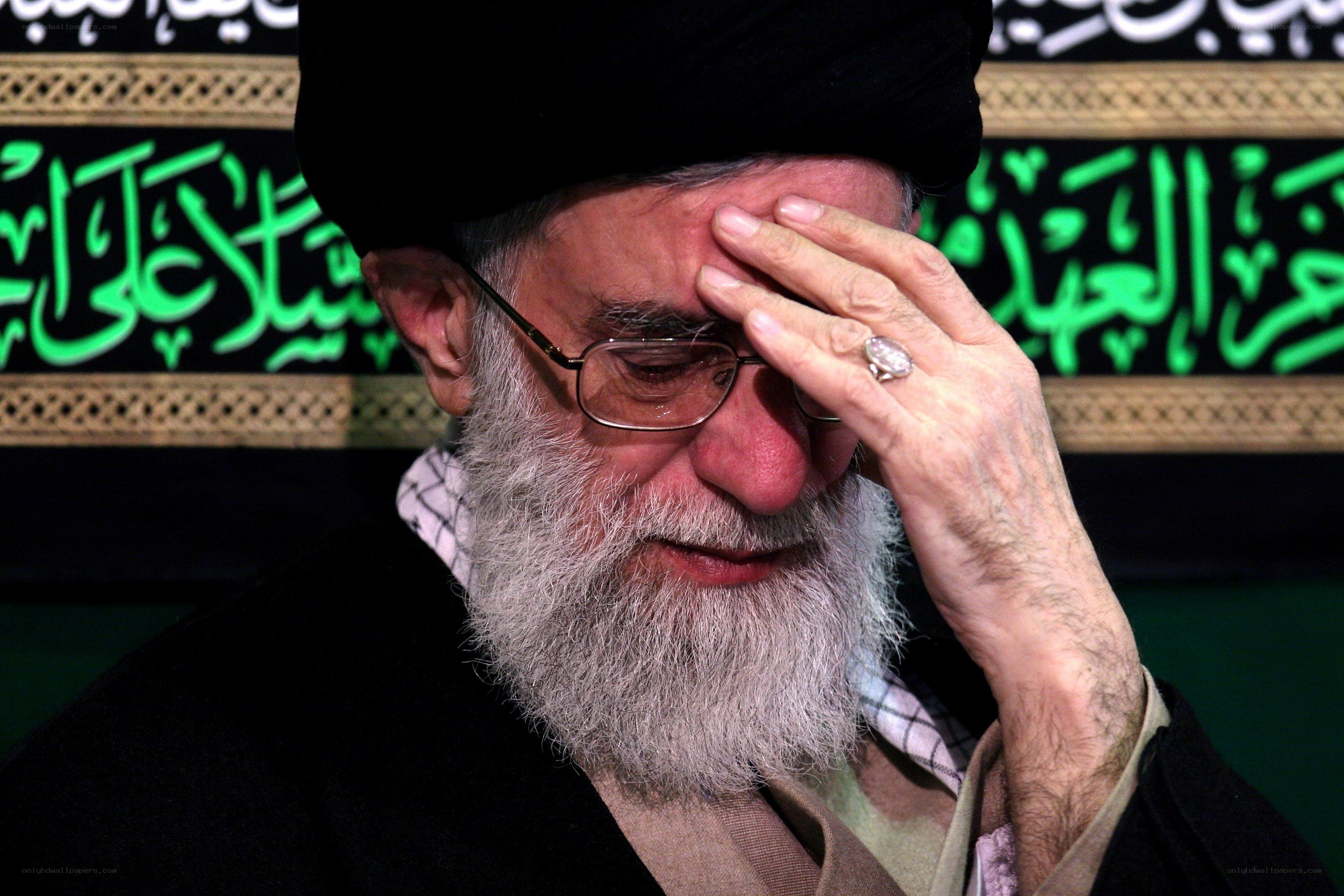 religious leader with hand on forehead