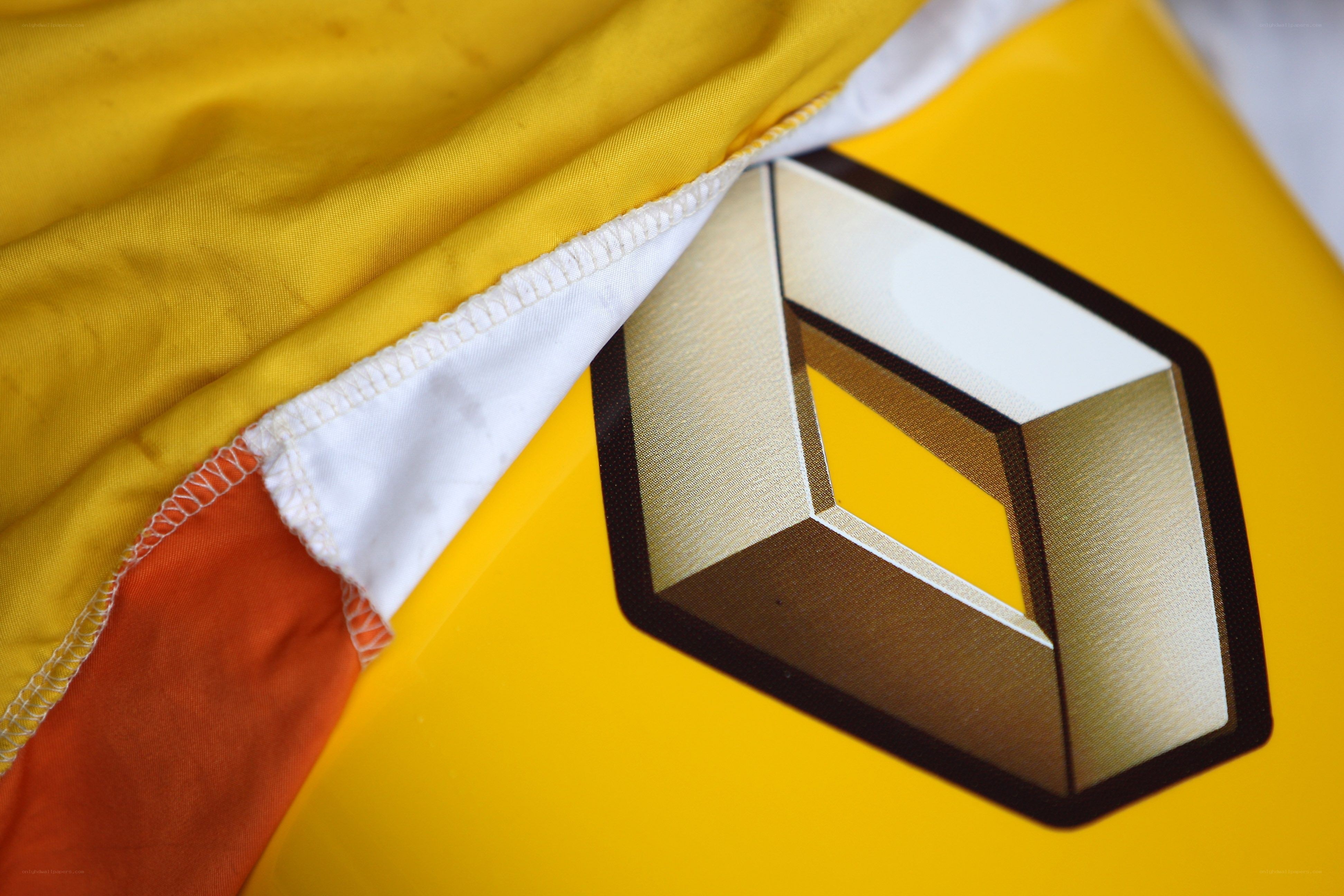 Renault logo on yellow fabric