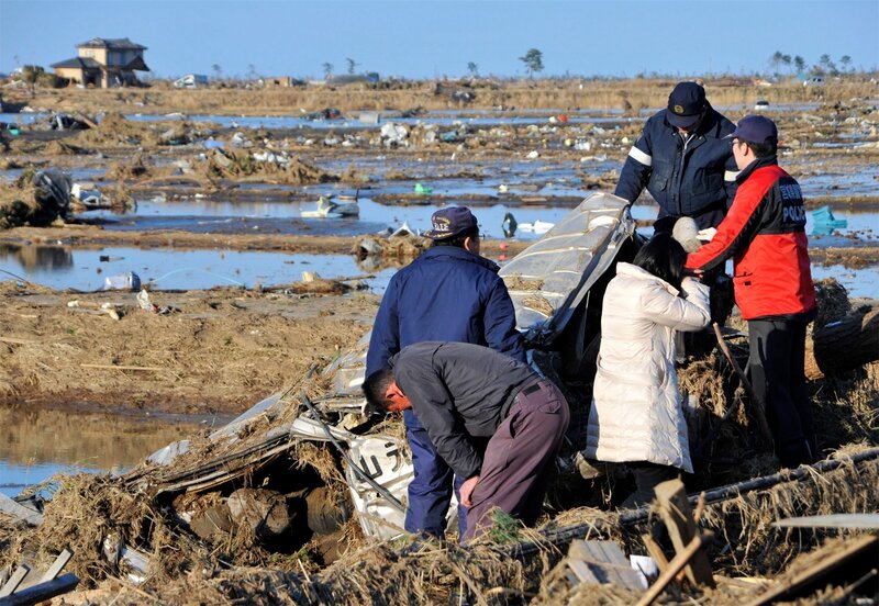Rescue Workers at Debris