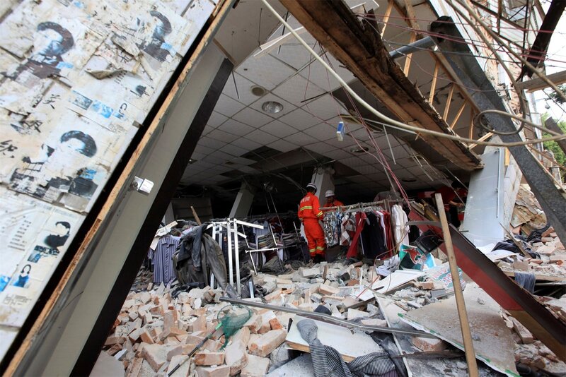 Rescue Workers in Rubble