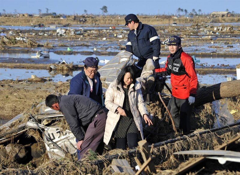 Rescue Workers with Debris