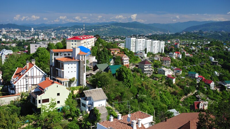 Residential Buildings on Hillside — Green