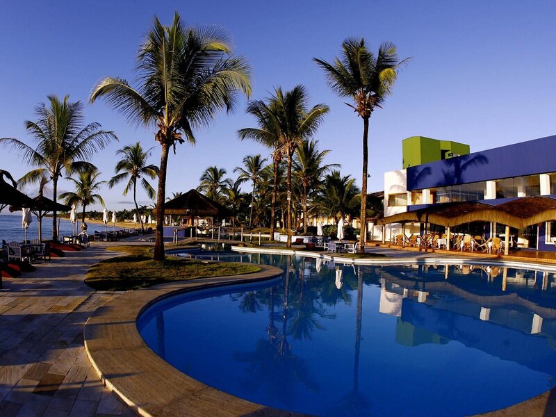 Resort Pool and Palm Trees — Blue
