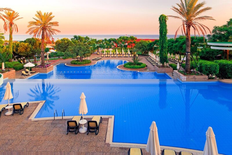 Resort Pool Area — Blue, Serene, Sunset