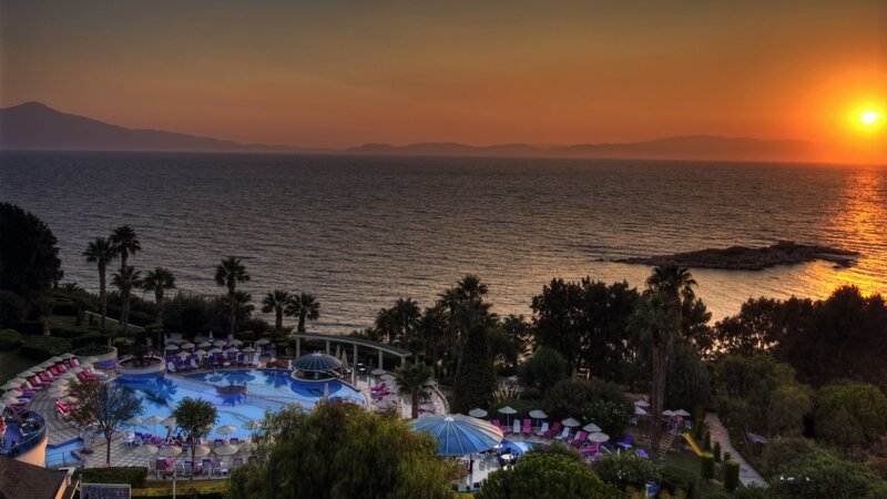 Resort Pool at Sunset — Orange