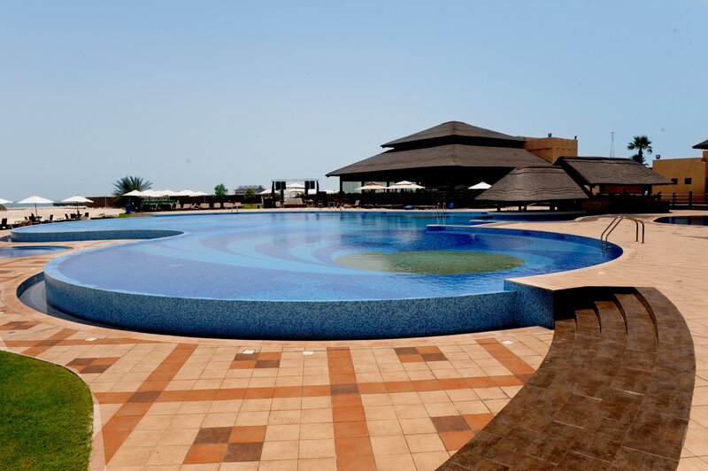 Resort pool with beach view
