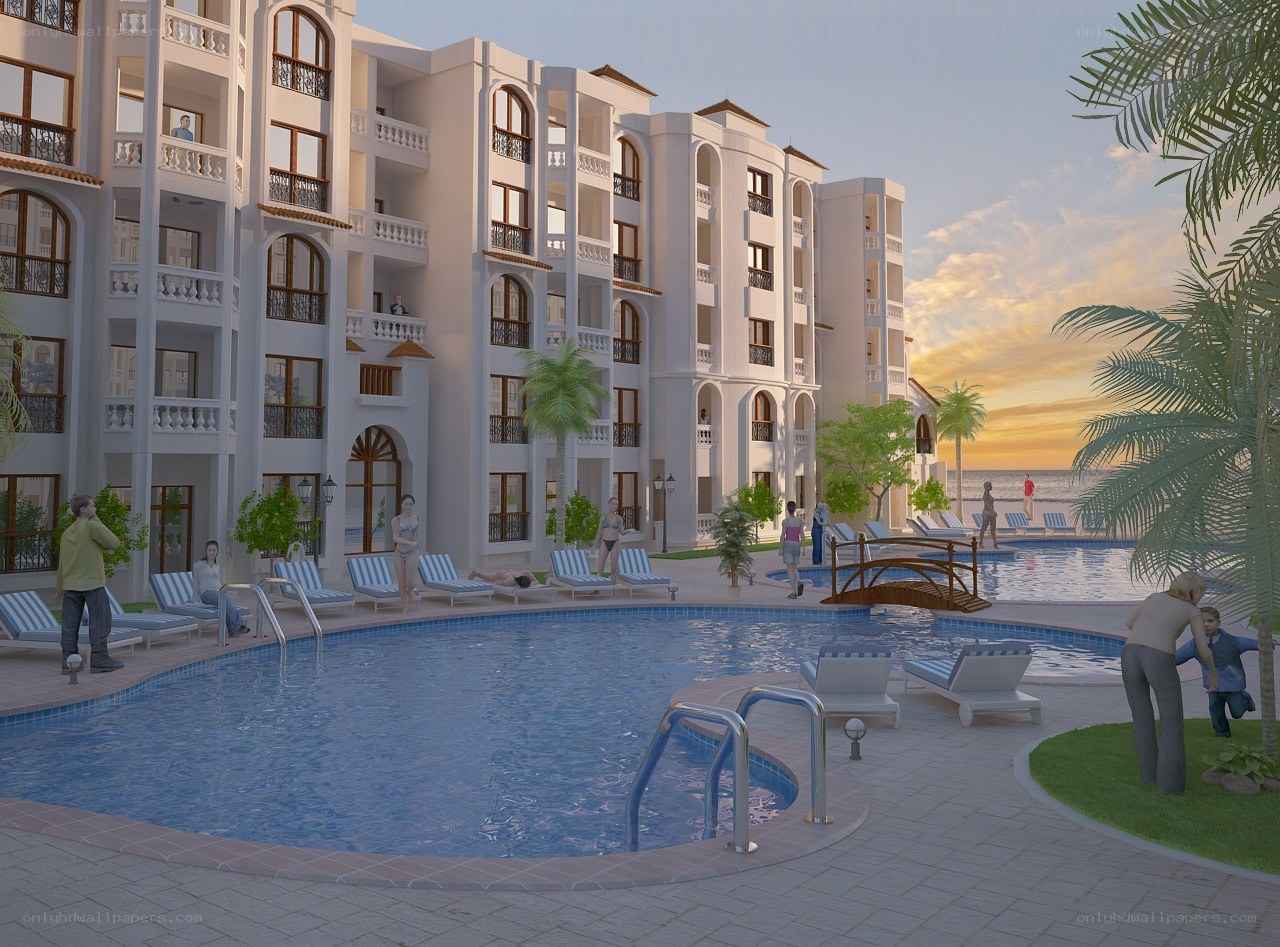Resort with swimming pools at sunset